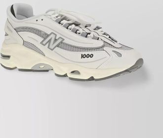 New Balance mesh overlay sneakers segmented outsole