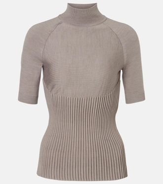 Alaia Ribbed-knit turtleneck wool-blend top