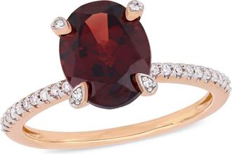 Amour 3 CT TGW Oval-cut Garnet and 1/10 CT TW Diamond Ring In 10K Rose Gold