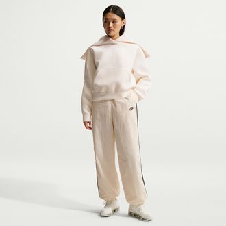 Nike Womens Nike Sportswear Windrunner Woven Pants in White | IM8031-103