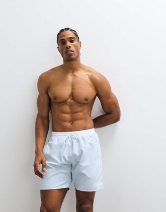 HUGO BOSS Starfish - Pantaloncini da bagno azzurri con stampa del logo-Blu