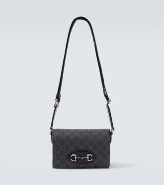 Gucci GG Supreme leather-trimmed canvas crossbody bag