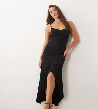 Fashionkilla Esclusiva Fashionkilla - Vestito lungo in tessuto sinuoso doppiato modellante nero con spalline sottili e volant sul davanti asimmetrico