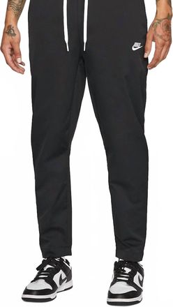 Nike Woven Tapered Leg Pants In Black