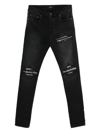 Amiri patchwork-distressed cotton jeans - Black
