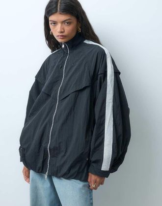 Nike giacca da tuta balloon nera e bianca-Nero