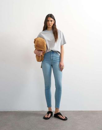 Topshop Jamie - Jeans a vita alta candeggiati-Blu