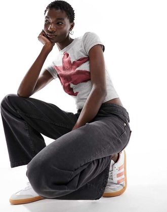 Motel Jeans a vita bassa nero vintage con gambe parallele