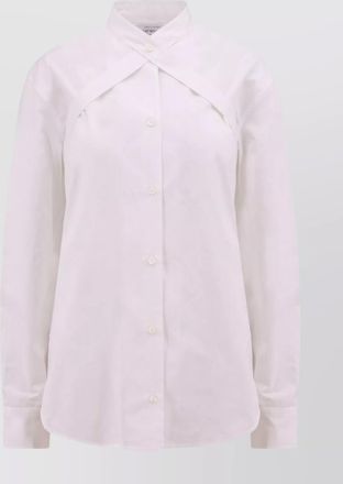 Off-white cotton long-sleeve shirt with straps and metal buckle