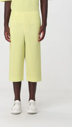 Homme Pliss&eacute; Issey Miyake Pantaloni cropped slim Homme Pliss&eacute; Issey Miyake in tessuto tecnico plissettato