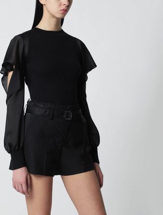 sacai Black knit top with semi-sheer sleeves