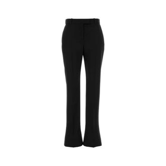 Alexander McQueen Wollen uitlopende broek - Dames - Wijde Broeken - Zwart - M - Wol - Broeken