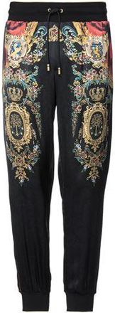 Dolce & Gabbana PARTES DE ABAJO - Pantalones en YOOX.COM