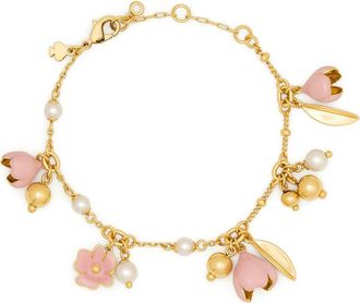 Kate Spade New York golden bloom flower charm bracelet in Pink. at Nordstrom