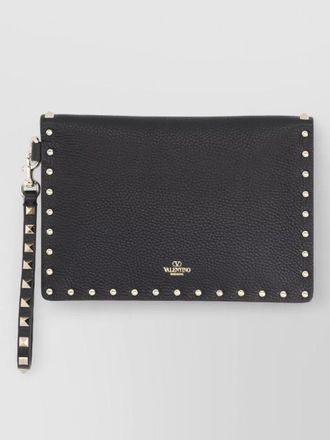 Valentino Garavani envelope clutch bag studded design wrist strap