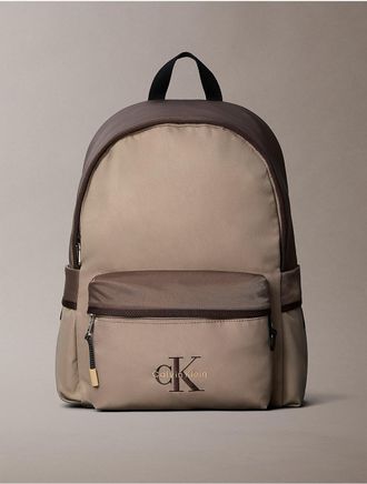 Calvin Klein Mens Bold Monologo Colorblock Round Backpack - Brown