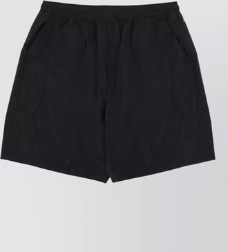 Yohji Yamamoto tailored shorts featuring back and side pockets