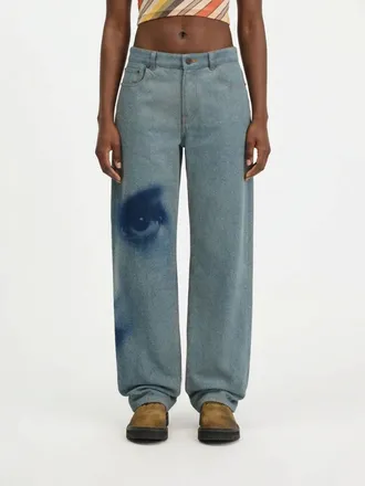 Jean Paul Gaultier Jeans wide leg a vita bassa in denim con stampa grafica