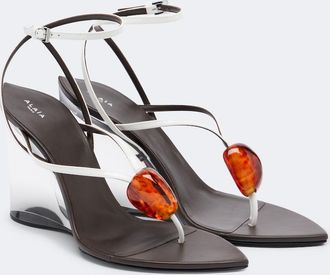 Alaia Ala&iuml;a Invisible patent leather thong sandals