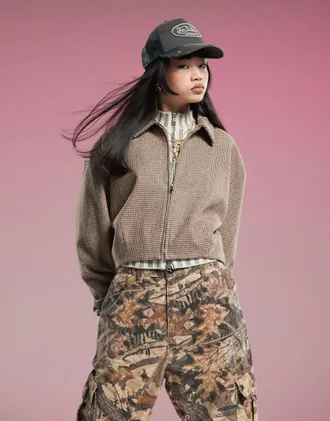 Motel carlo cropped checked bomber jacket in brown