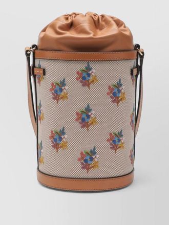 Valentino Garavani bucket bag floral pattern leather trim strap