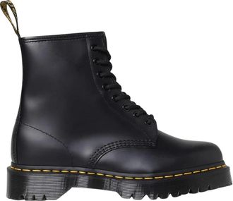 Dr. Martens Leren veterlaarzen met rubberen zool - Dames - Veterlaarzen - Zwart - 36 EU - Leer - Schoenen