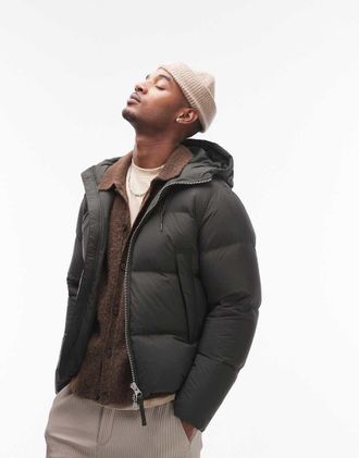 Arket Piumino imbottito in piuma kaki scuro con cappuccio-Verde