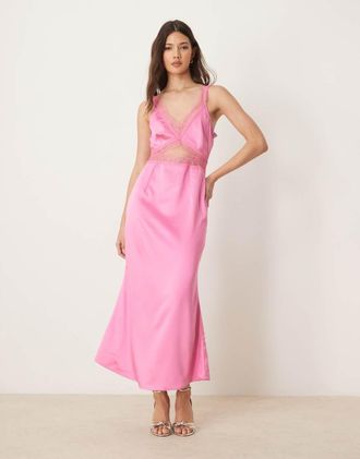 Never Fully Dressed Mimi - Vestito sottoveste al polpaccio rosa con cut-out e dettagli in pizzo