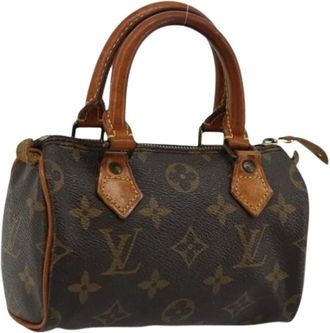 Louis Vuitton Pre-owned Mini Bags, female, Brown, Size: ONE SIZE Pre-owned Mini Monogram Canvas Hand Bag