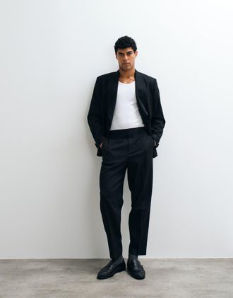Asos Pantaloni da abito affusolati comodi neri metallizzati con motivo gessato-Nero