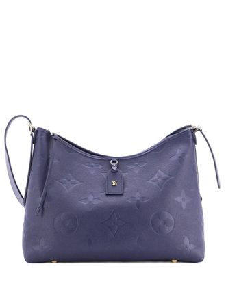Louis Vuitton CarryAll Monogram Empreinte Giant MM hobo bag - Blauw