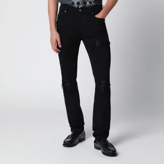 Amiri Ripped skinny cotton jeans in black