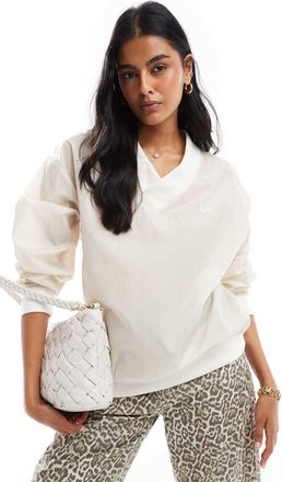 Nike Windrunner woven long sleeve crew neck top in orewood-Neutral