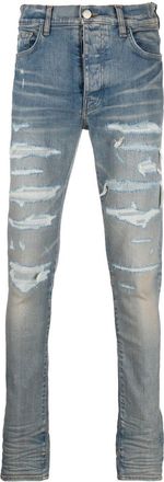 Amiri distressed-effect skinny jeans - men - Polyester/Cotton/Spandex/Elastane - 29 - Blue