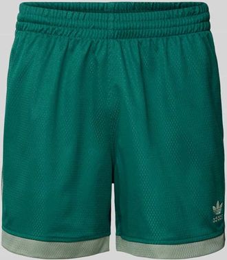 adidas Originals Relaxed Fit Shorts mit Label-Stitching Modell Mockeylet in Dunkelgruen, Gr&ouml;&szlig;e S