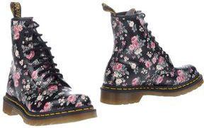 Dr. Martens CALZADO - Botines de ca&ntilde;a alta en YOOX.COM