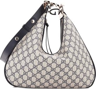 Gucci Borsa a spalla Attache media in tela cerata GG - Blu