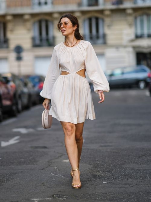 woman in white mini dress