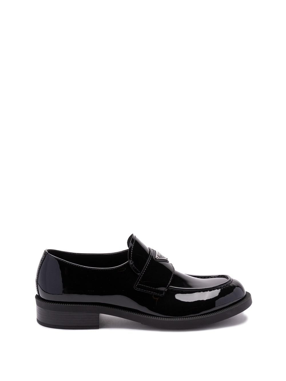 Prada: Black Slip-On Shoes now up to −50% | Stylight