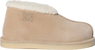Miu Miu embroidered-logo shearling boots - Toni neutri
