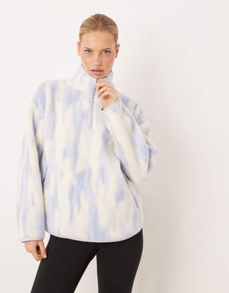 Sweaty Betty Pile soffice blu con stampa con zip corta