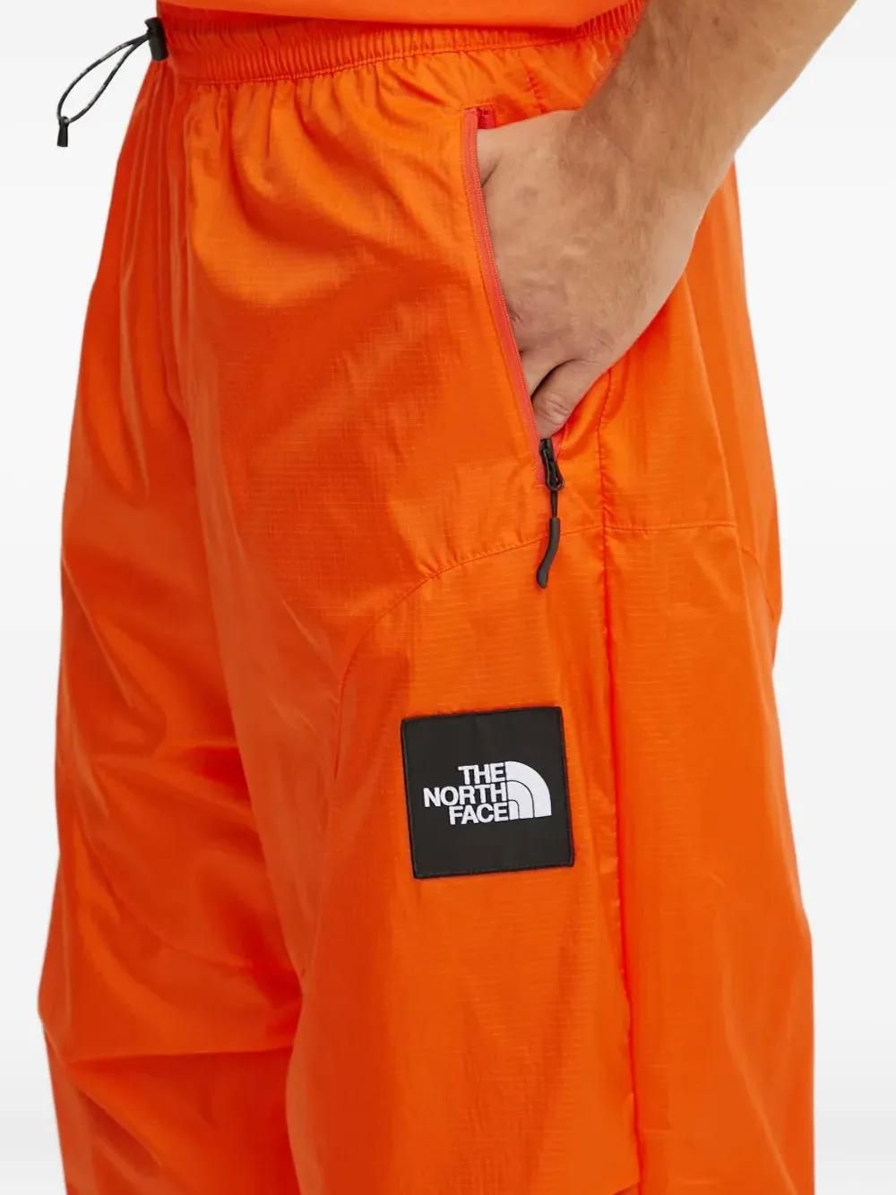 The North Face x Yinka Ilori Jogginghose mit Kordelzug Orange ab
