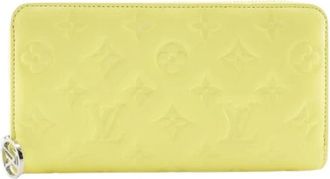 Louis Vuitton Pre-owned Lange Portemonnee (bi-fold) - Dames - Vintage Accessoires - Geel - ONE Size - Leer - Vintage