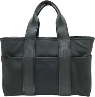 Herm&egrave;s Pre-owned Tote Bags, female, Black, Size: ONE SIZE Pre-owned Acapulco PM Nylon Leather Tote Bag