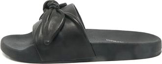 Stuart Weitzman Sandali slides con fiocco - Nero