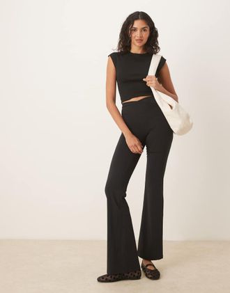 Tala DayFlex 30 - Pantaloni da yoga a vita alta a portafoglio a zampa neri-Nero