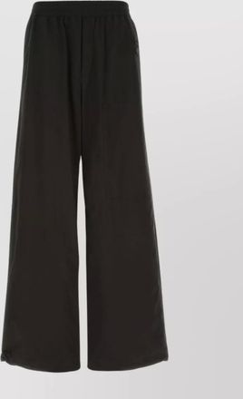 Off-white versatile wide-leg pant with seam and slit pockets