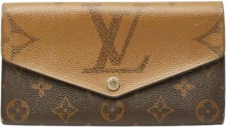 Louis Vuitton Pre-owned Lange Portemonnee (bi-fold) - Dames - Vintage Accessoires - Bruin - ONE Size - Leer - Vintage