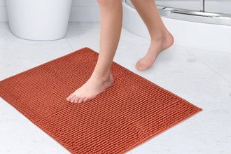 TJ Hughes Noodle Soft Touch Non-Slip Bathroom Rug in Burnt Orange - TJ Hughes