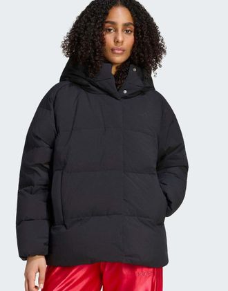 adidas Helionic - Piumino nero con cappuccio